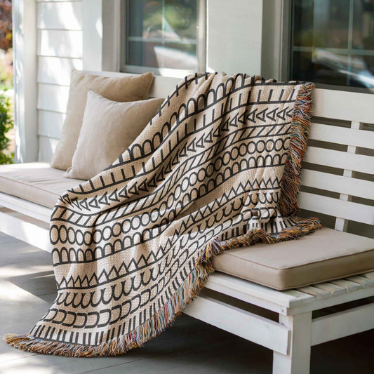 Modern Geometric woven blanket with geometric pattern styled for layered home decor