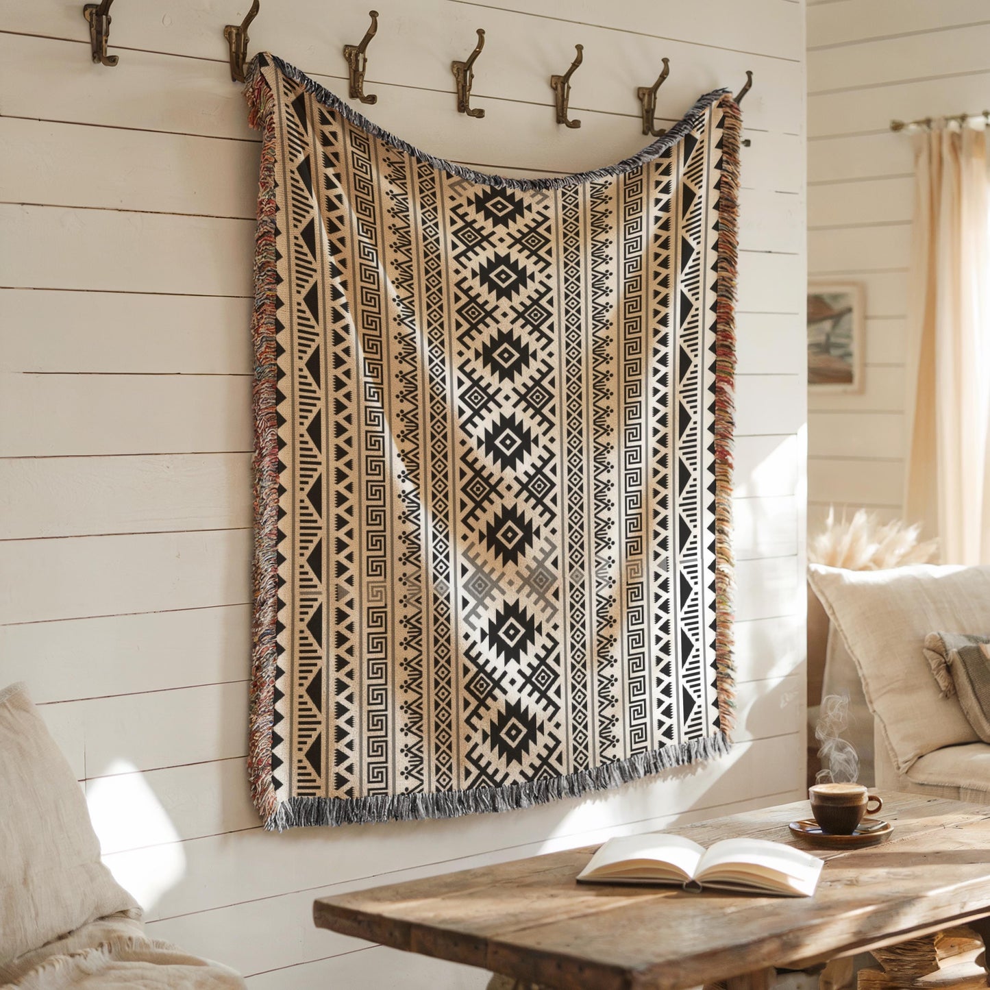 a cozy living room with a wooden coffee table in the center, a white couch, and a patterned throw blanket hanging on the wall.