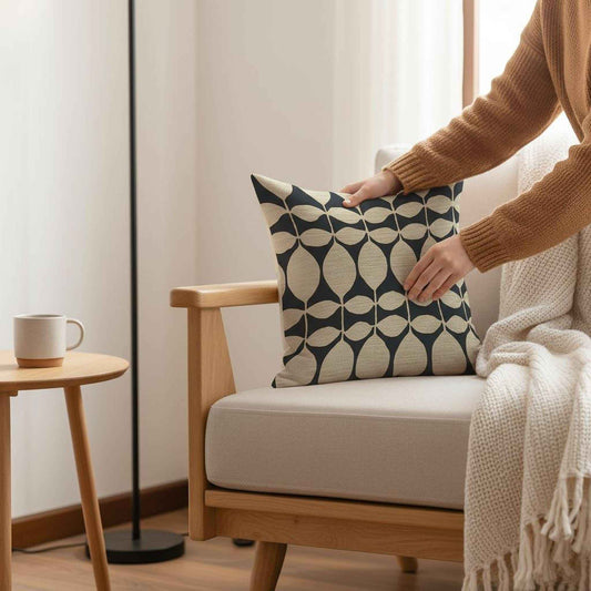 Scandinavian Inspired pillow cover with geometric pattern styled on a sofa or bed