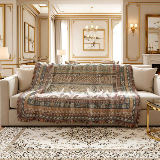 Southwestern woven blanket with geometric pattern styled for layered home decor