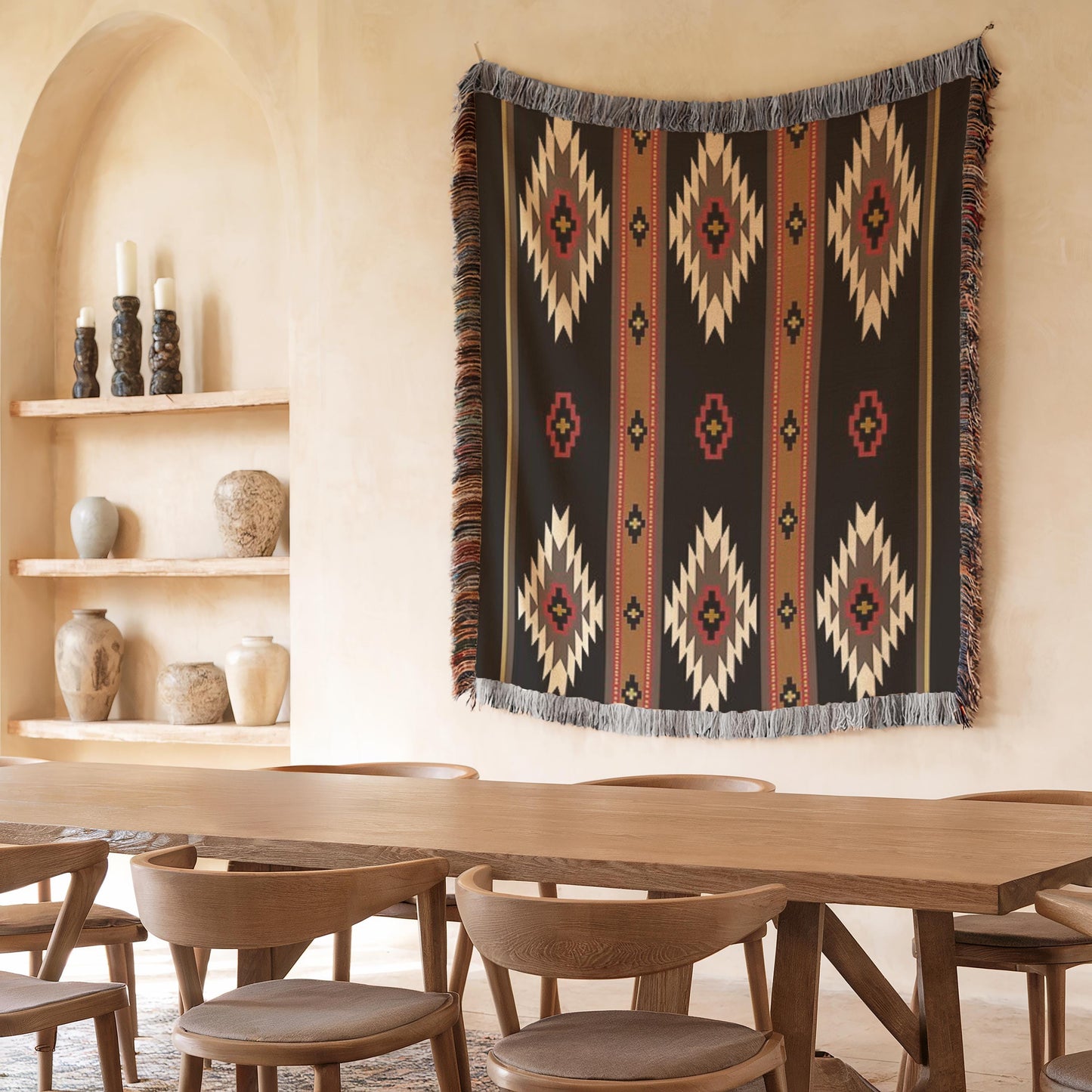 a dining room with a wooden table and chairs, a decorative rug hanging on the wall, and shelves displaying various vases and candles.