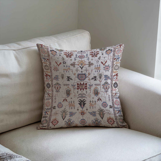 Anatolian Inspired pillow cover with rug-style pattern styled on a sofa or bed