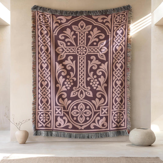 Khachkar woven wall hanging in plum and dusty pink, with grape vines and an interlaced border