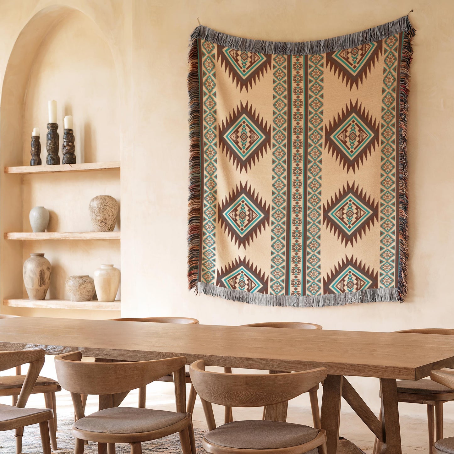 a dining room with a wooden table and chairs, a large colorful rug hanging on the wall, and shelves displaying various decorative items.