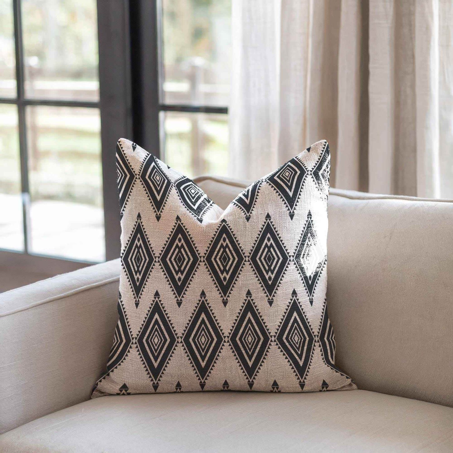 Ikat Throw Pillow – Rustic Boho Cushion With Cotton Ikat Fabric & Fringed Edges - timelessbohochic.com