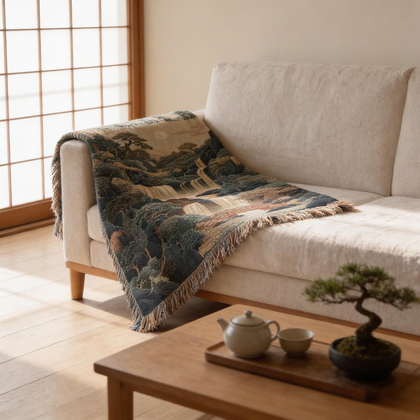 Boho woven blanket with woven pattern styled for layered home decor