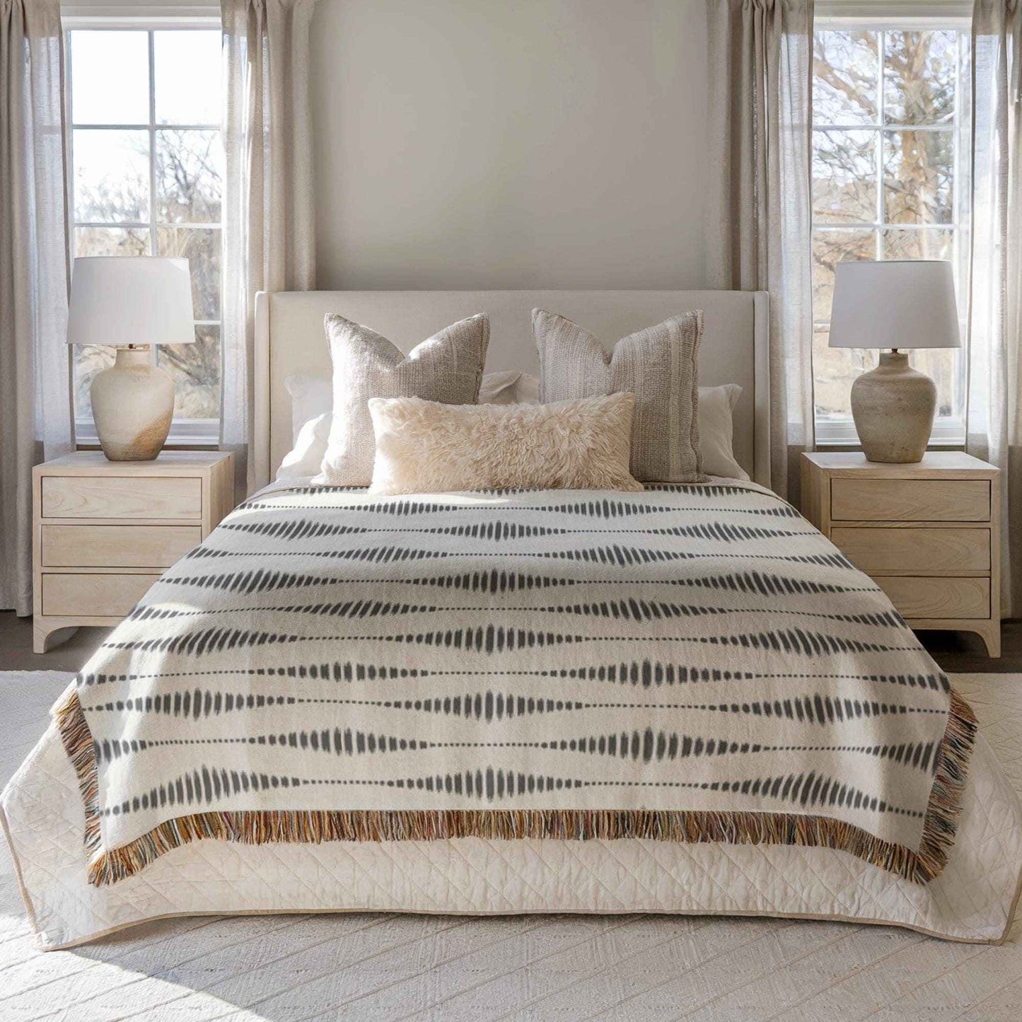 Modern Geometric woven blanket with geometric pattern styled for layered home decor