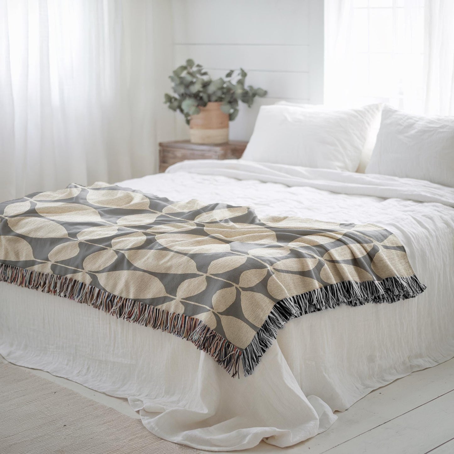 Modern Geometric woven blanket with geometric pattern styled for layered home decor