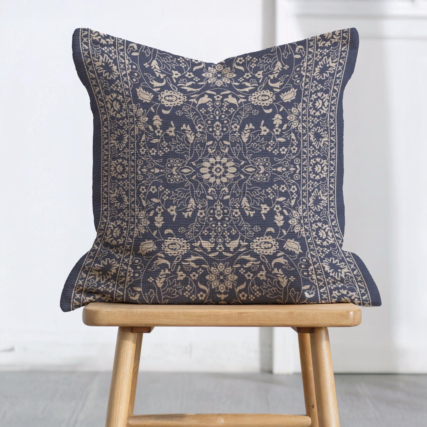 Moroccan Inspired throw pillow with floral pattern styled on a sofa or bed