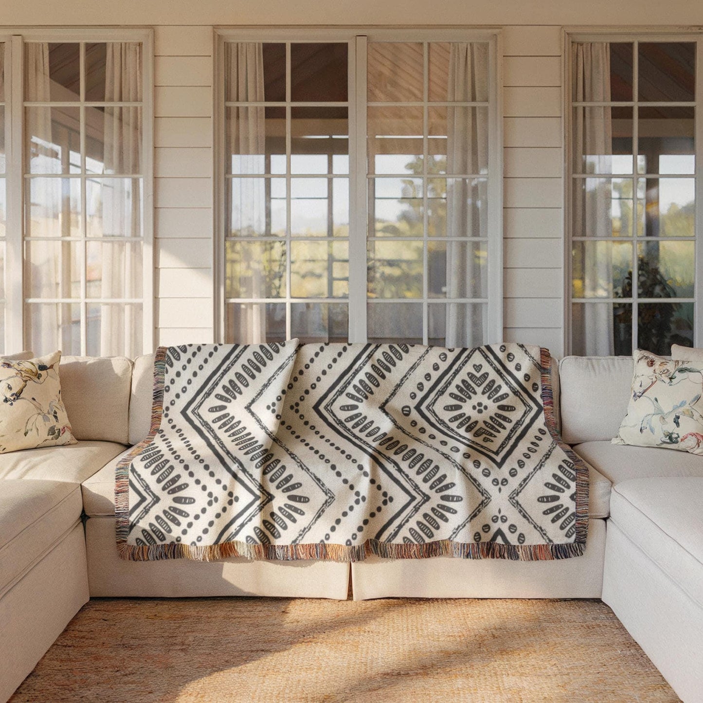 Modern Geometric pillow cover with geometric pattern styled on a sofa or bed