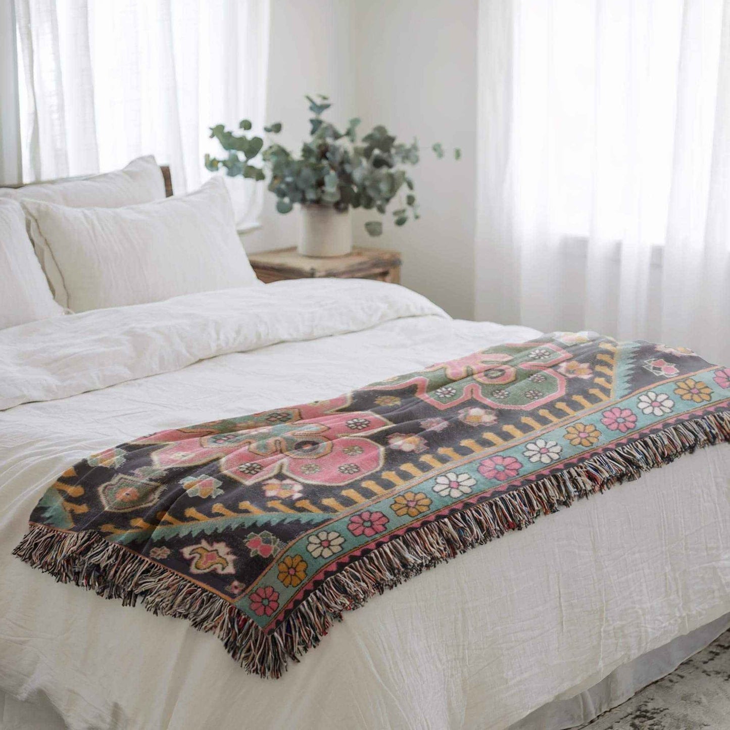 Anatolian Inspired woven blanket with floral pattern styled for layered home decor
