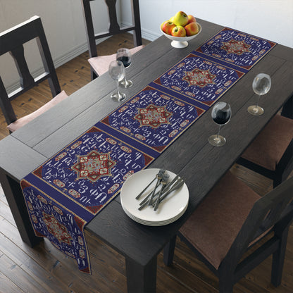 Armenian alphabet table runner in deep blue shown on a dark wood dining table