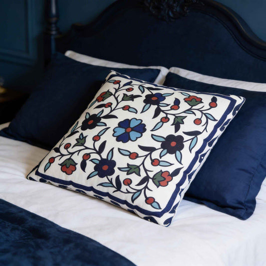 Anatolian Inspired pillow cover with woven pattern styled on a sofa or bed