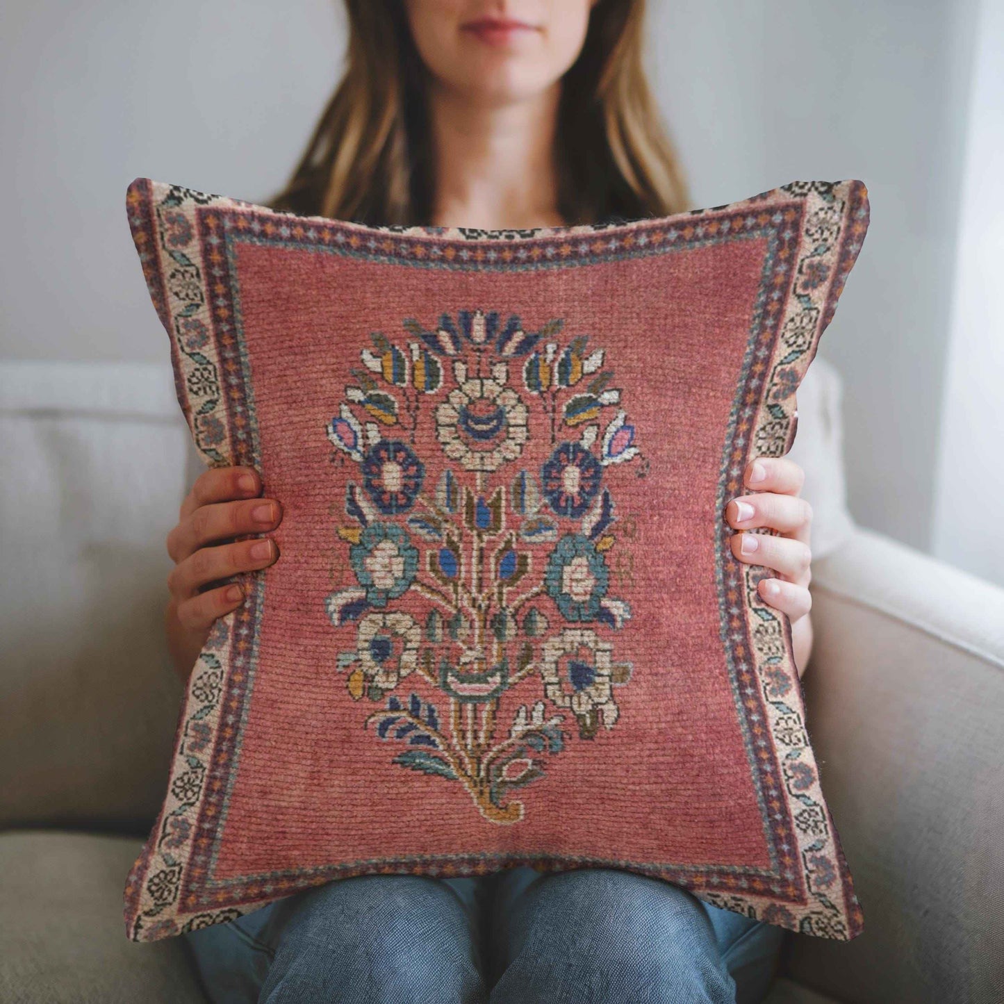 Anatolian Inspired throw pillow with floral pattern styled on a sofa or bed
