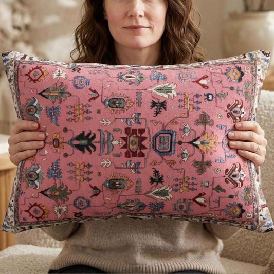 Anatolian Inspired throw pillow with rug-style pattern styled on a sofa or bed