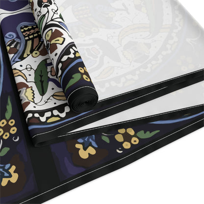 Armenian peacock table runner in dark navy shown on a dark wood dining table
