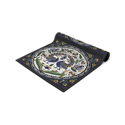 Armenian peacock table runner in dark navy shown on a dining table