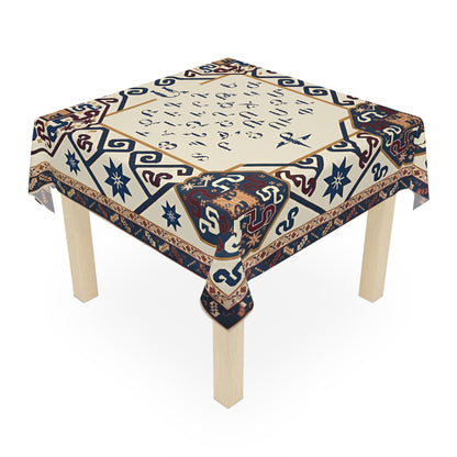 Cream Armenian alphabet tablecloth draped over a square table