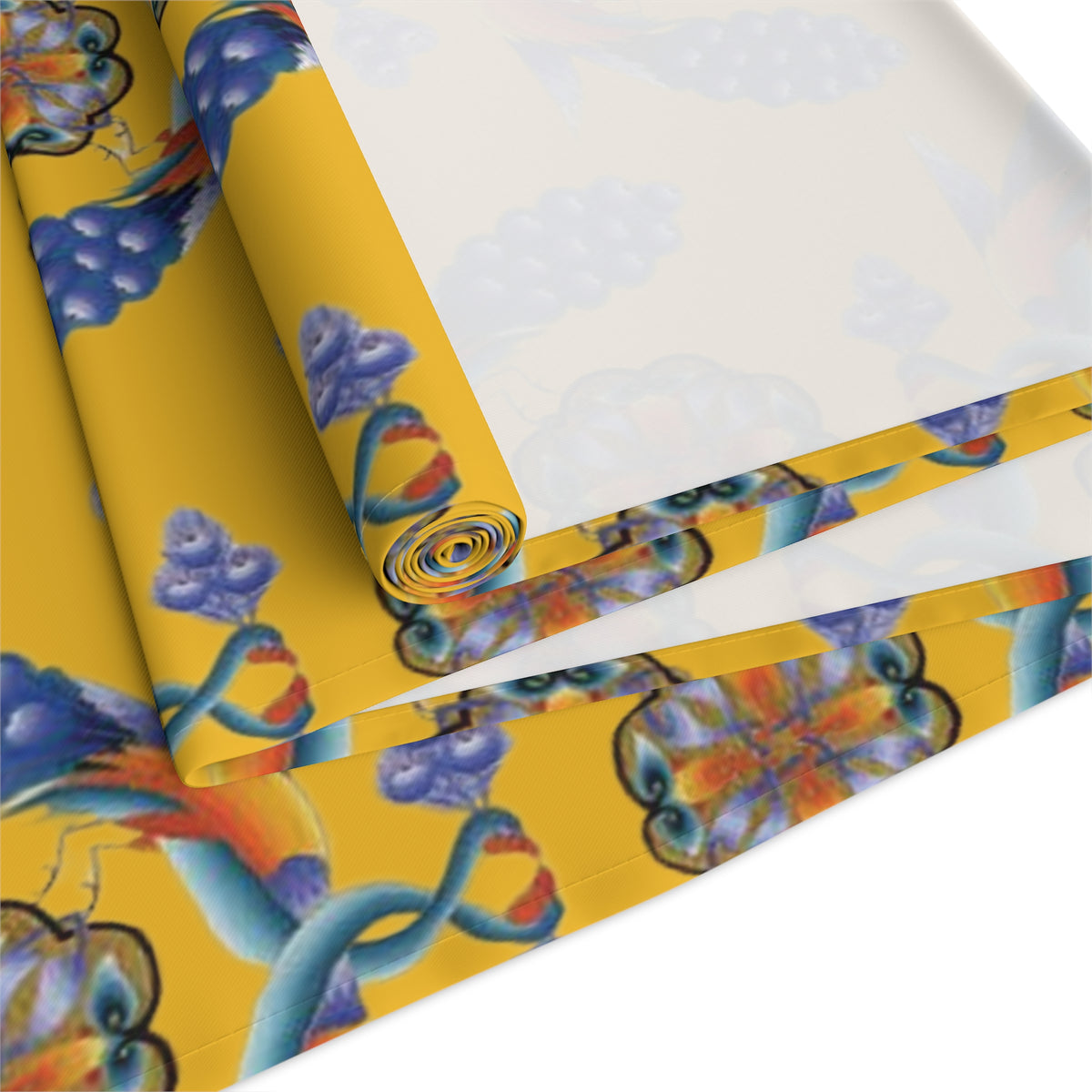Yellow Armenian bird table runner shown on a dark wood dining table
