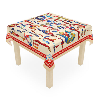 Armenian bird letter tablecloth draped over a square table