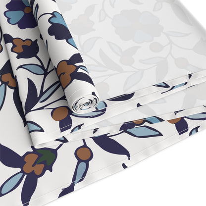 White Armenian Iznik floral table runner shown on a dining table
