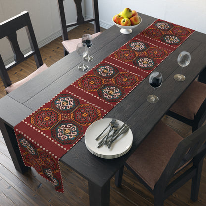 Anatolian Armenian carpet table runner in deep red on a dining table set with white plates and glasses