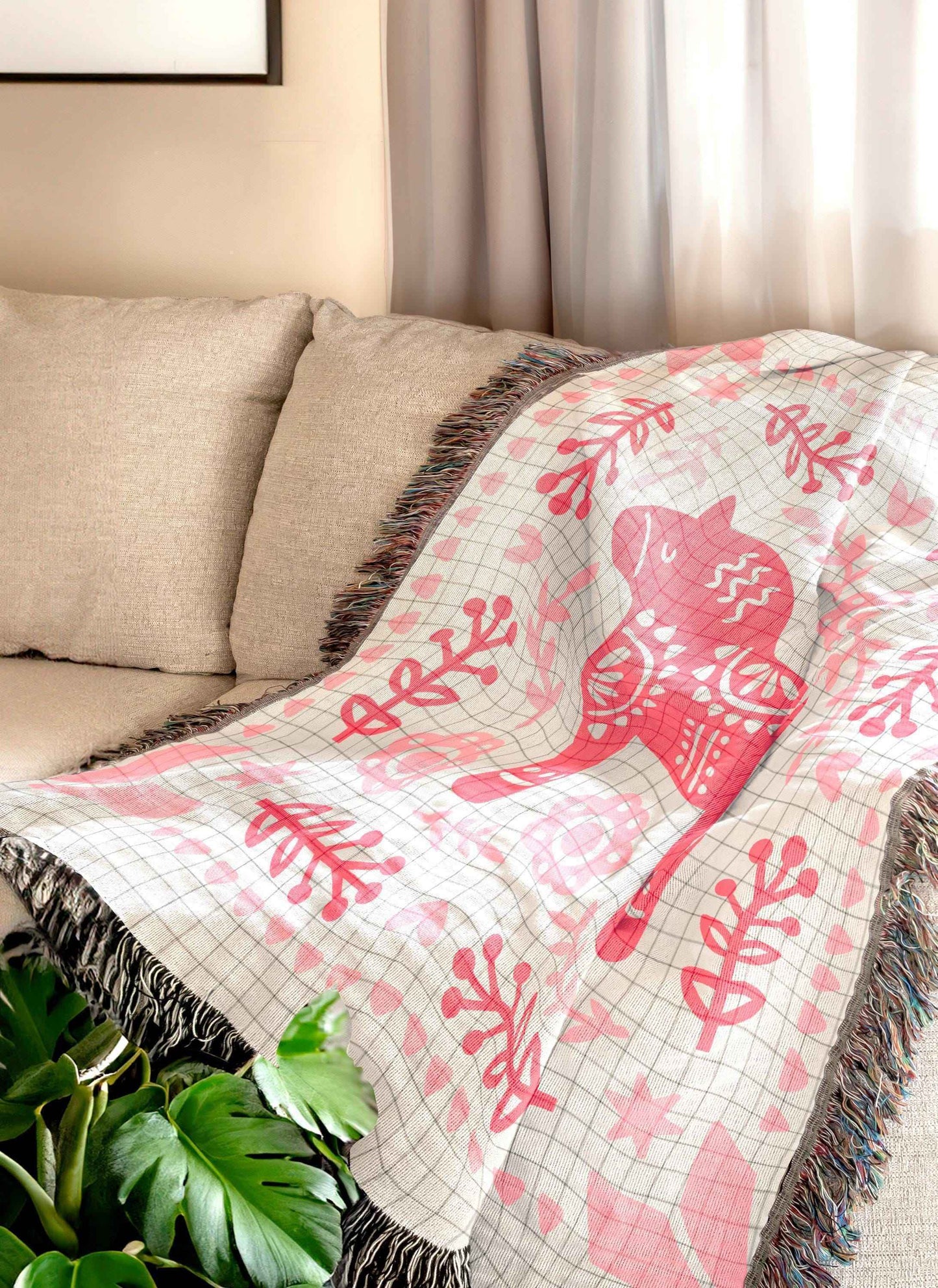 Scandinavian Inspired woven blanket with woven pattern styled for layered home decor