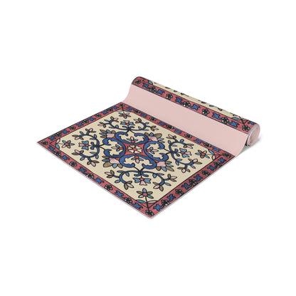 Cream Armenian floral table runner on a dining table set with white plates and glasses