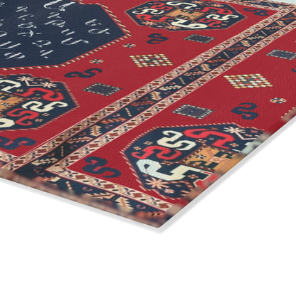 Red Armenian carpet cutting board with a family name on a wooden worktop with a knife alongside