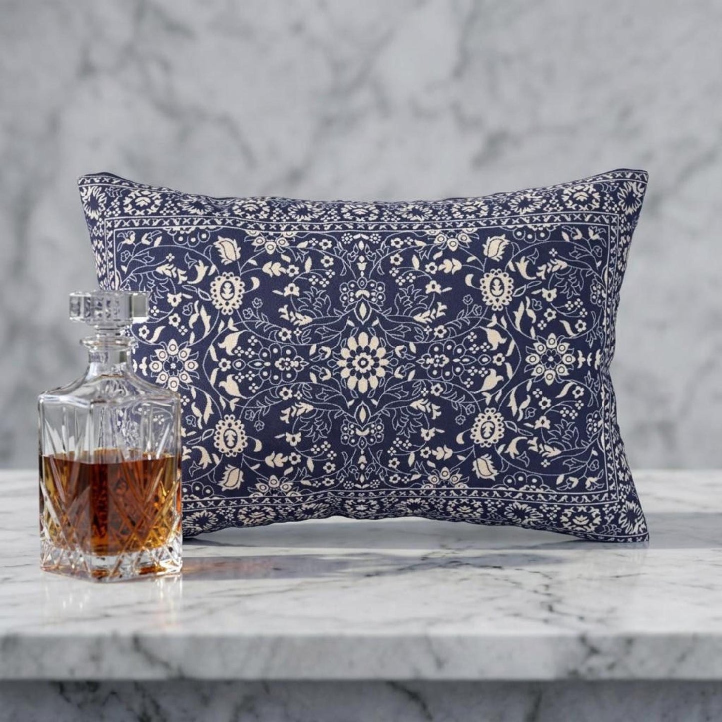 Caucasian Rug Inspired throw pillow with geometric pattern styled on a sofa or bed