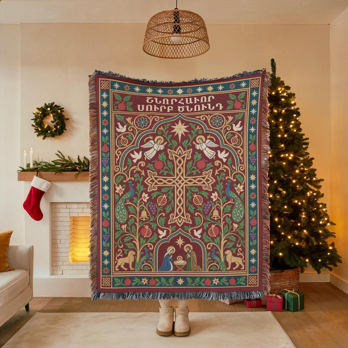 Armenian cross and Nativity woven blanket held up in front of a decorated Christmas tree
