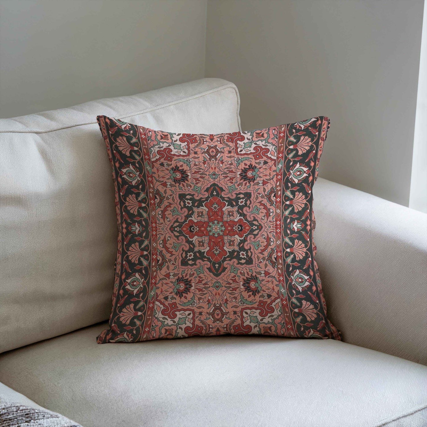 Anatolian Inspired throw pillow with rug-style pattern styled on a sofa or bed