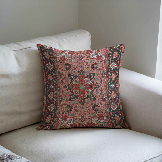 Anatolian Inspired throw pillow with rug-style pattern styled on a sofa or bed