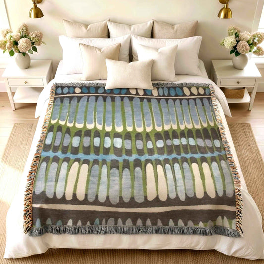 Modern Geometric woven blanket with geometric pattern styled for layered home decor