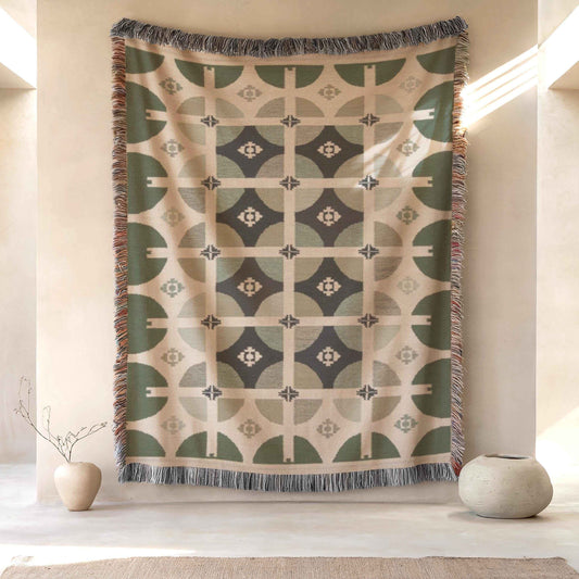 Scandinavian Inspired woven blanket with geometric pattern styled for layered home decor