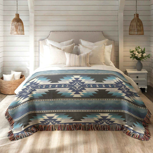 Southwestern woven blanket with geometric pattern styled for layered home decor