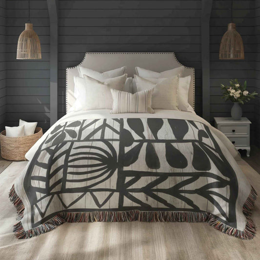 Modern Geometric woven blanket with geometric pattern styled for layered home decor