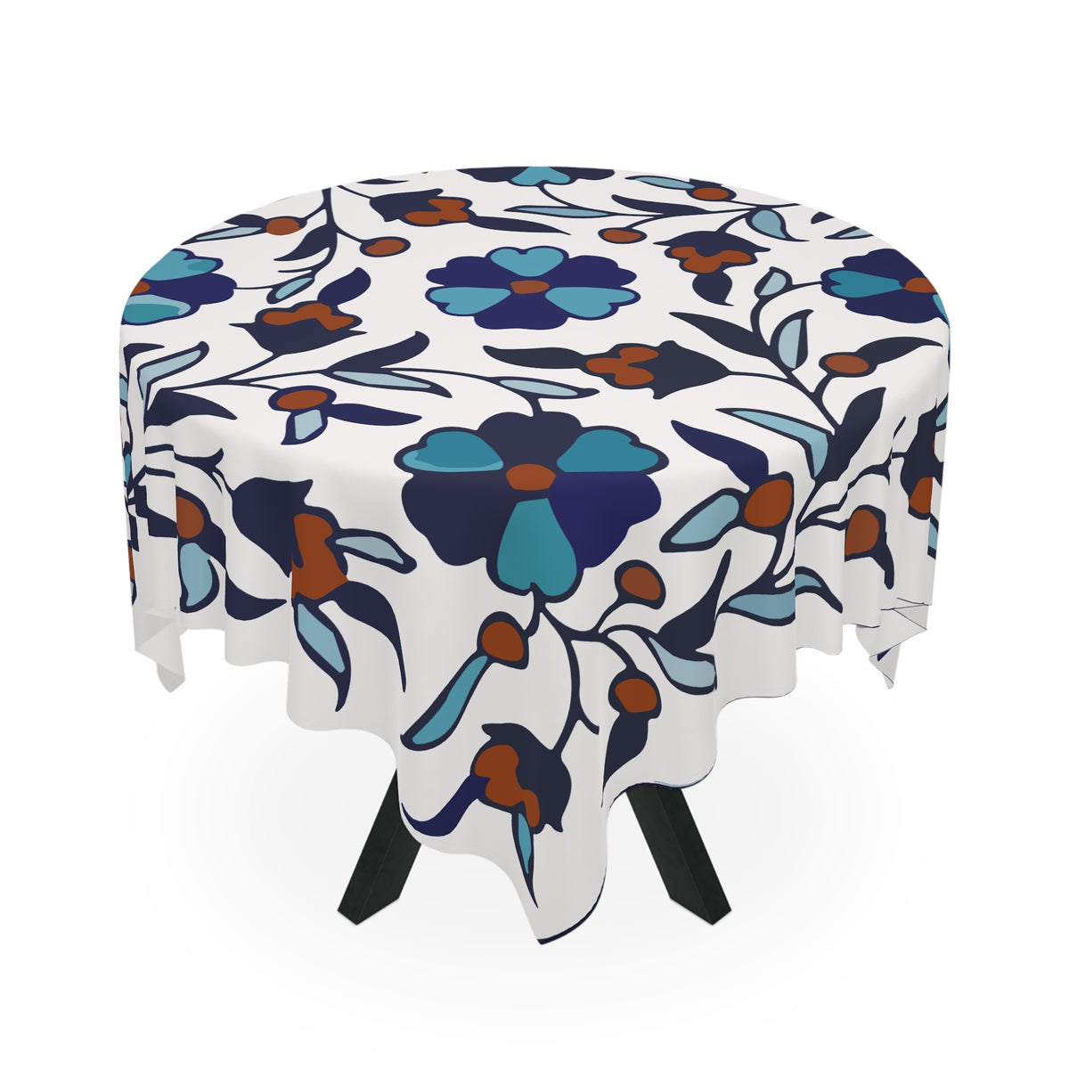 Blue and teal Armenian tablecloth on a rectangular table with wooden chairs and house plants