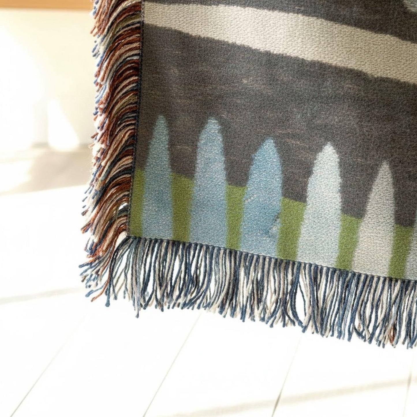Modern Geometric woven blanket with geometric pattern styled for layered home decor