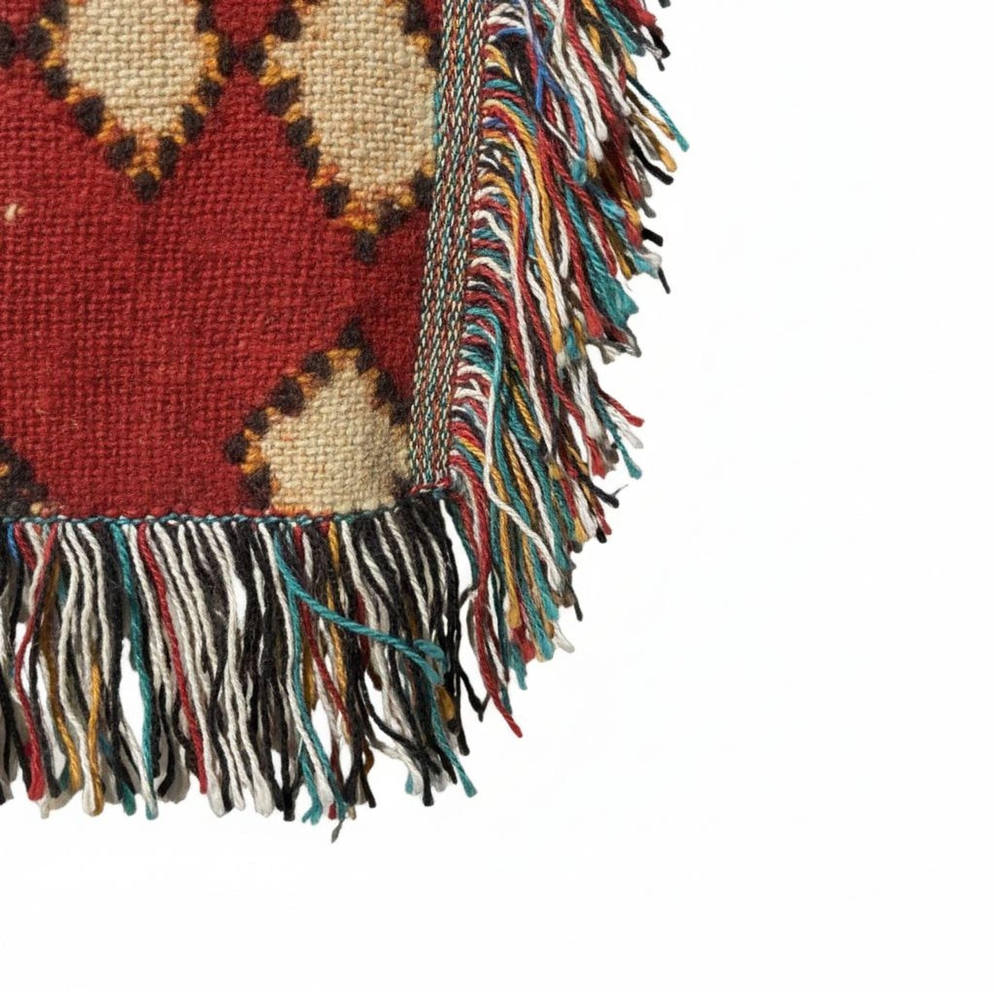 Moroccan Inspired woven blanket with woven pattern styled for layered home decor