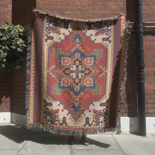Moroccan Inspired woven blanket with rug-style pattern styled for layered home decor