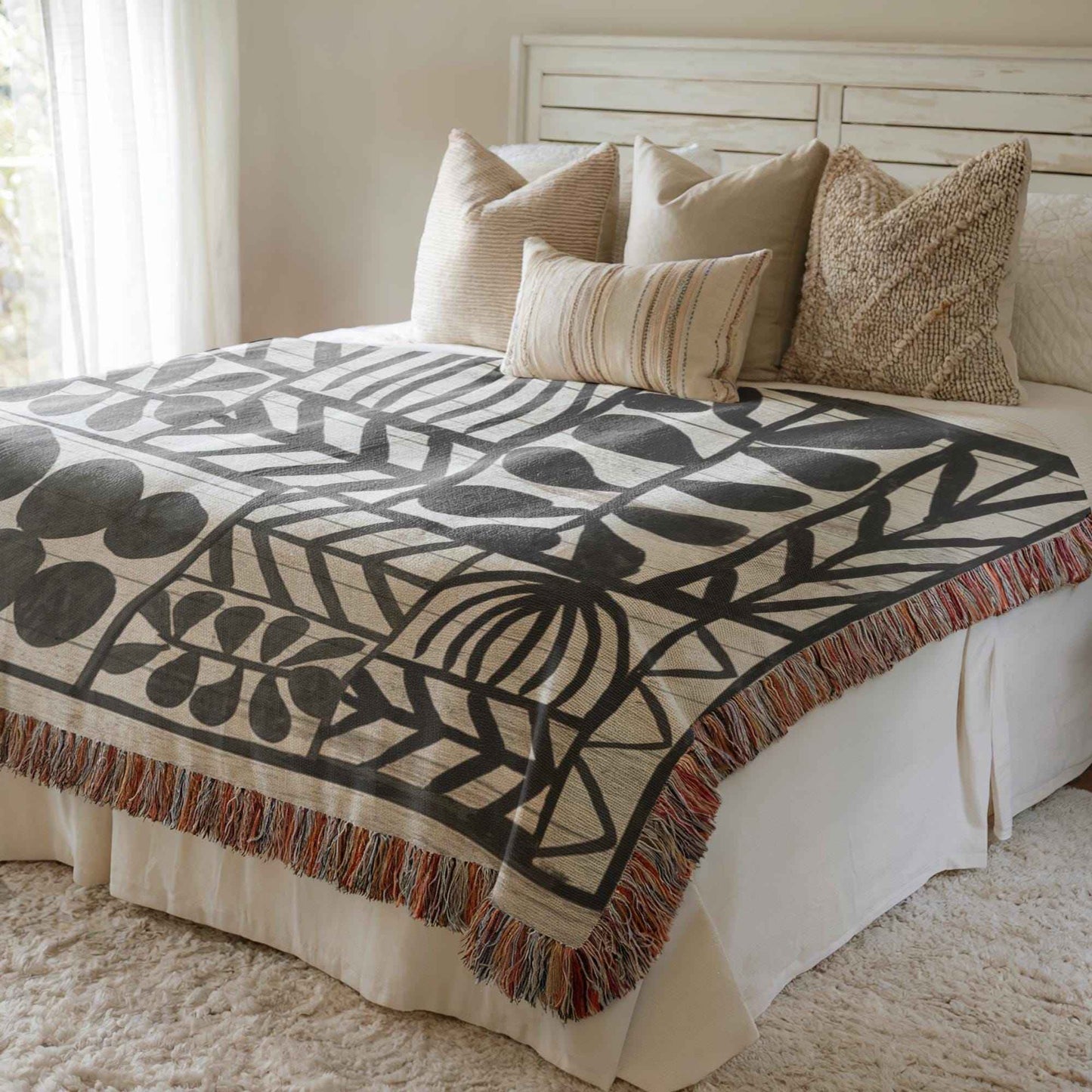 Modern Geometric woven blanket with geometric pattern styled for layered home decor