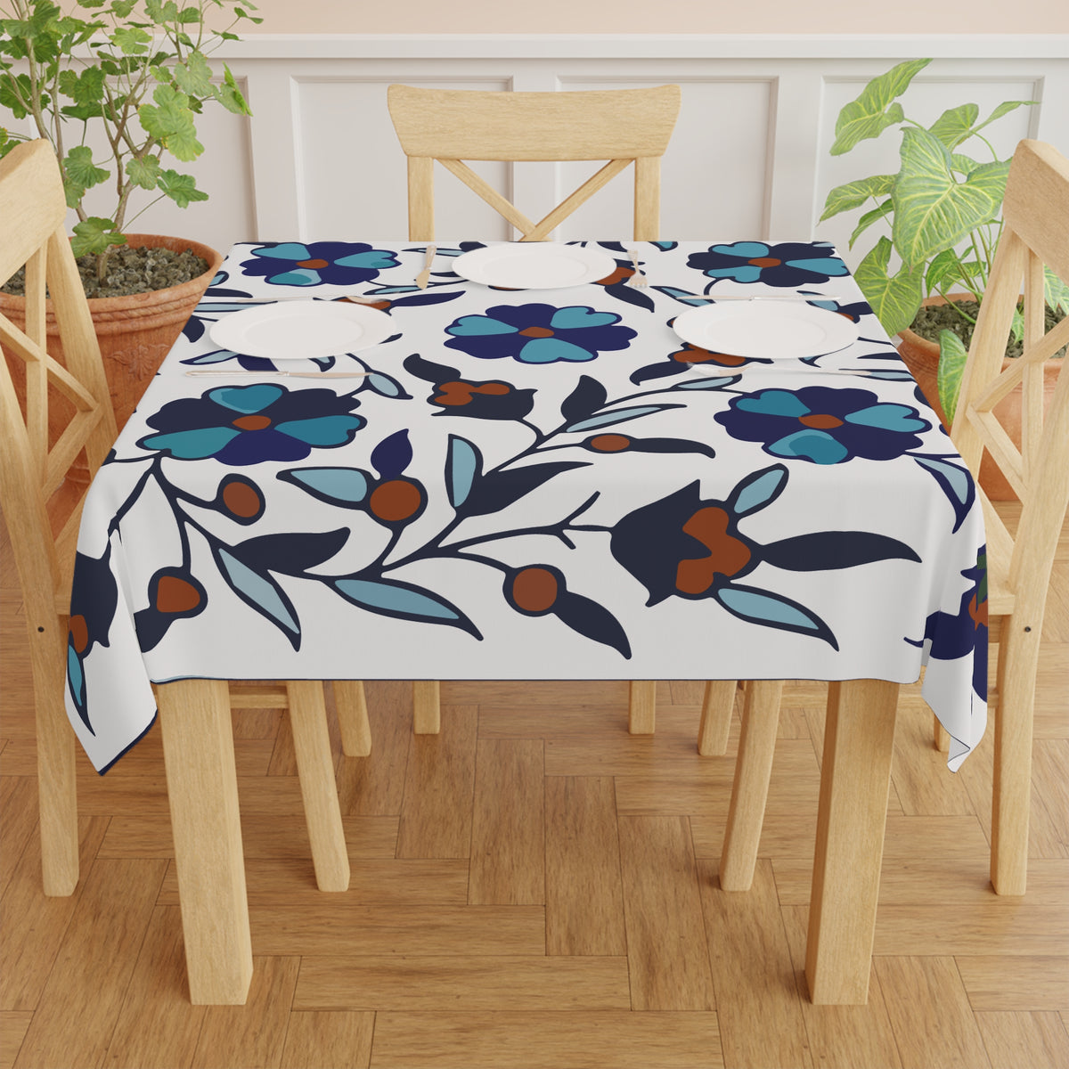 Blue Armenian tablecloth with large teal flowers and rust berries on white