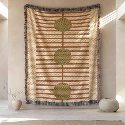 Scandinavian Inspired woven blanket with woven pattern styled for layered home decor