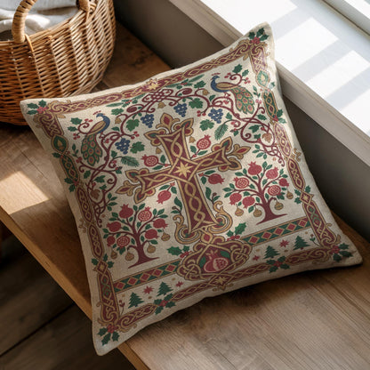 Armenian Christmas pillow with cross and pomegranate trees resting on a wooden surface by a basket