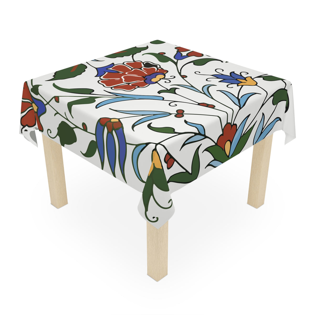 Blue and red Armenian pottery tablecloth on a rectangular table with wooden chairs and house plants