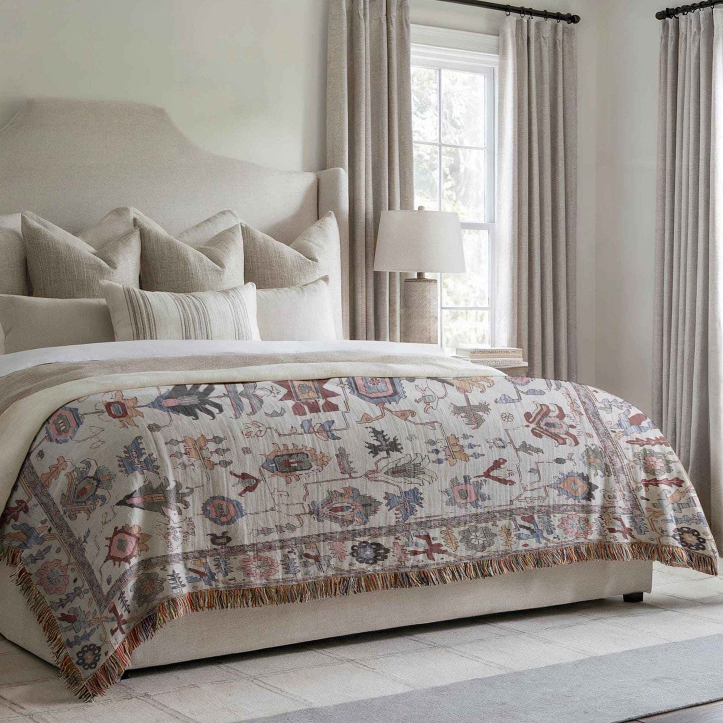 Anatolian Inspired woven blanket with rug-style pattern styled for layered home decor