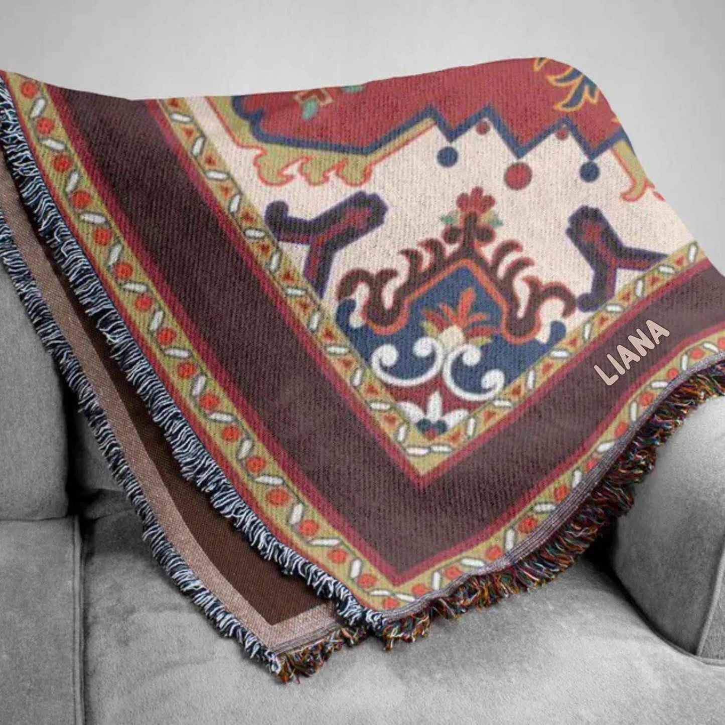 Moroccan Inspired woven blanket with rug-style pattern styled for layered home decor