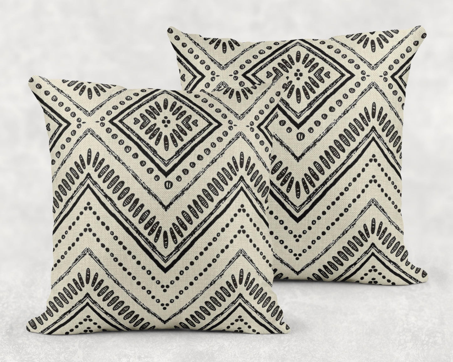Modern Geometric pillow cover with geometric pattern styled on a sofa or bed