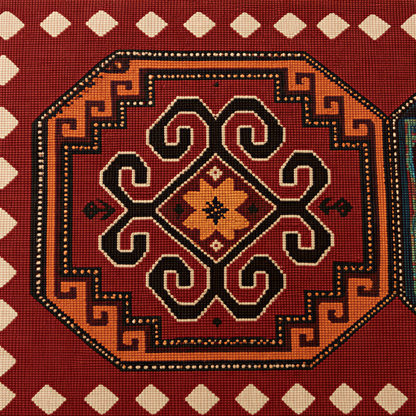 Close view of the octagonal carpet medallions in green, gold and cream on red